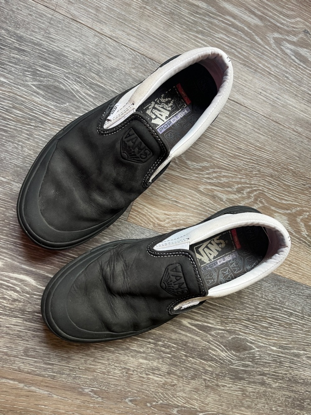 Vans Black and White Leather Slip-On Loafers